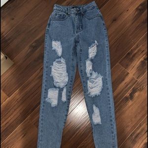 Mid washed distressed jeans from prettylittlething